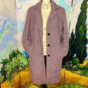 DKNY size medium, full length, purple and white, chevron pattern coat.